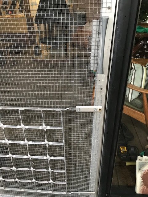 photo of a mended screen door