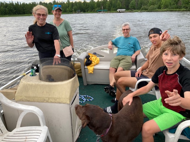 Photo of a family on a barge (water boat).