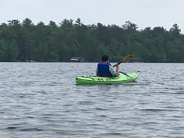 man kayaking