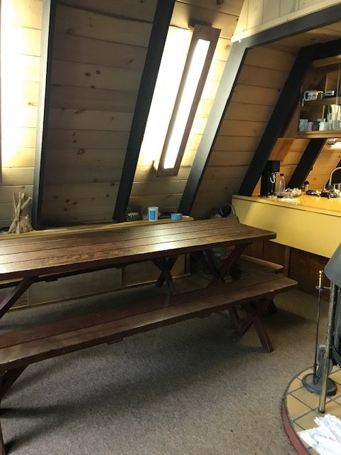 image of a-frame "living area" with picnic table