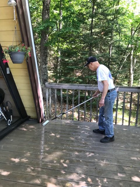 man cleaning decks