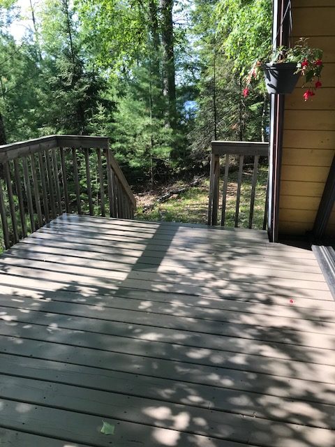 photo of stained front deck