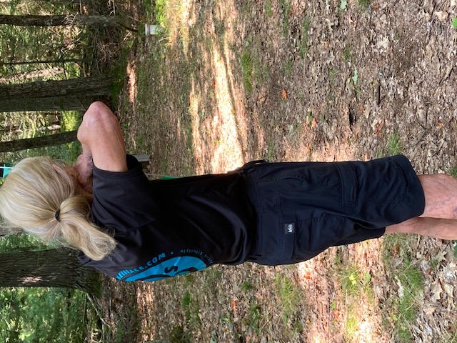 photo of woman practicing archery