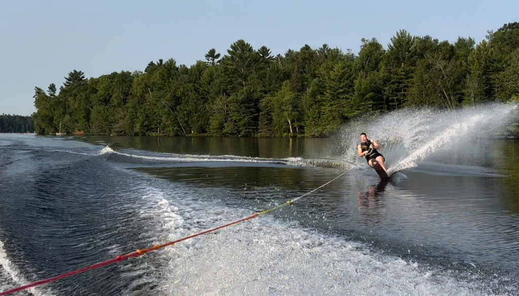 person waterskiing