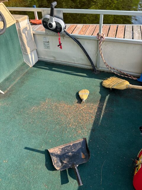 dust pan and broom on barge